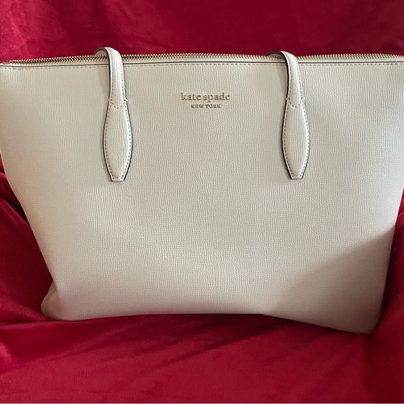 kate spade Handbags - kate spade Cream Tote Bag I have this same bag my iPad fits perfect in it.